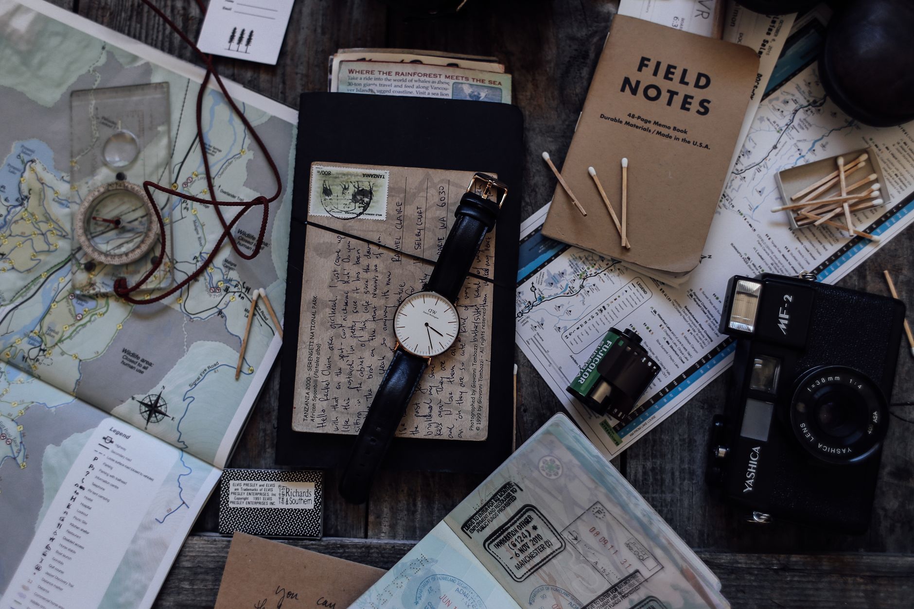 Travel journal editor reviewing maps
